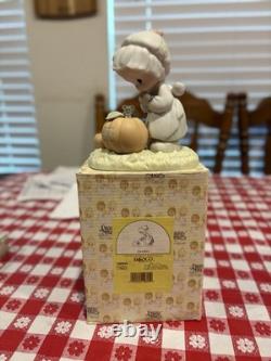 Precious Moments Porcelain Figurine