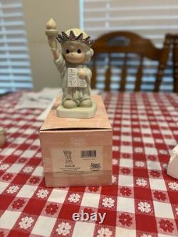 Precious Moments Porcelain Figurine