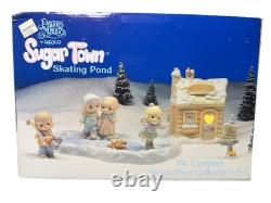 Precious Moments Sugar Town Skating Pond Complete 7 PC Collector Set BRAND NEW