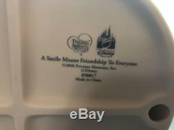 Precious moments 890017 a smile means friendship to everyone disney