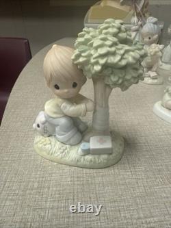 Precious moments figurines 13 Pieces