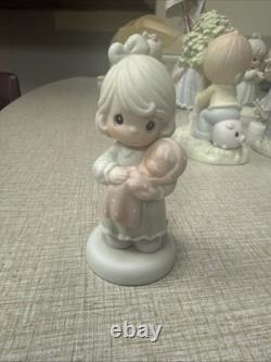 Precious moments figurines 13 Pieces