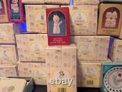 Precious moments figurines Lot of 53 WithCalendars, Coloring Books, Plates and Pins