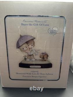 Precious moments figurines Showered With Love & Thot-fulness Signed