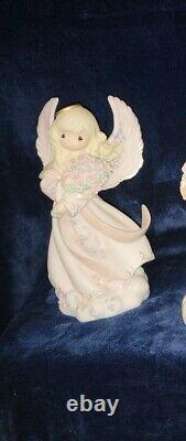 Precious moments figurines lot. 10 peices from large to small