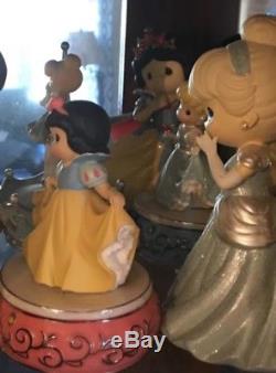 Precious moments lot of 25 disney music boxes, globes, and miscellaneous figurin