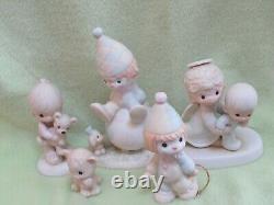 Vintage lot of 37 Precious Moments porcelain figurines