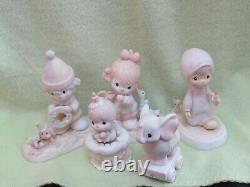 Vintage lot of 37 Precious Moments porcelain figurines